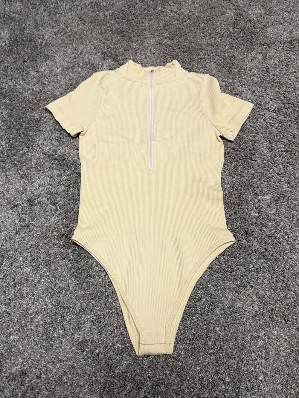 OQQ Cream Ribbed Zip-Front Bodysuit with Mock Neck